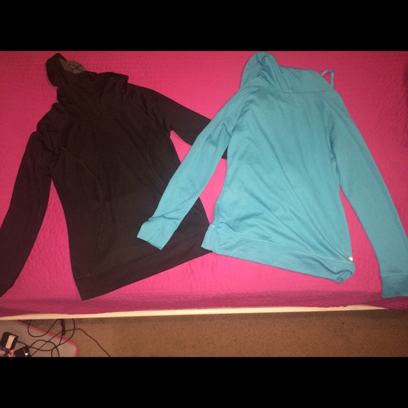 Two long sleeve pull over sweat shirts.