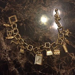 Burberry gold charm watch
