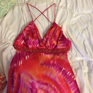 Pink orange prom dress with criss-cross open back.