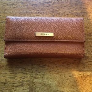 Gucci Wallet orangey brown with silver Gucci logo