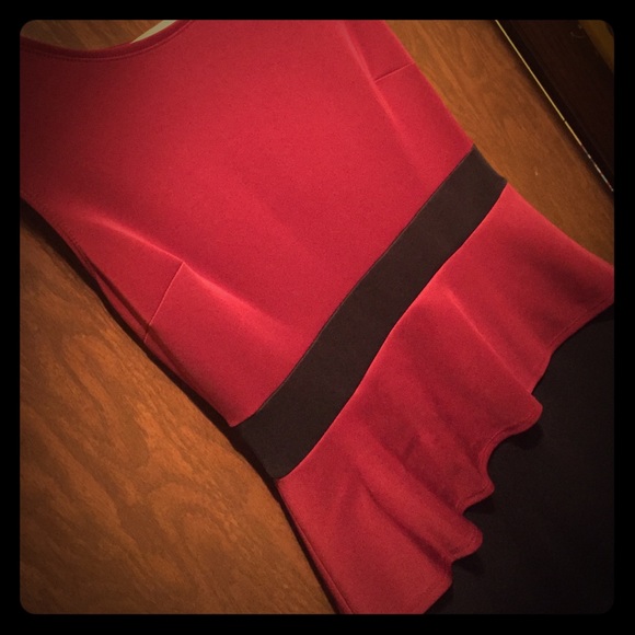 Dark red and black peplum fitted dress. Size 10.