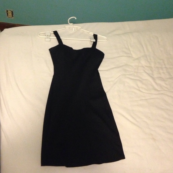 Mini black dress with cutout back