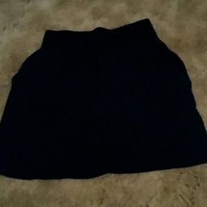 Blue skirt with pockets.