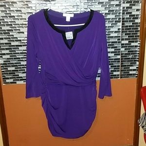 A purple V neck blouse