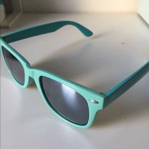 Teal-Blue colored sunglasses