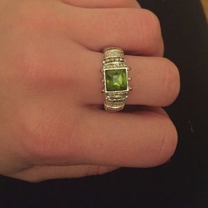 Silver ring with green diamond