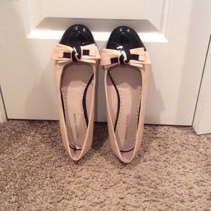 Nude and Black Flats