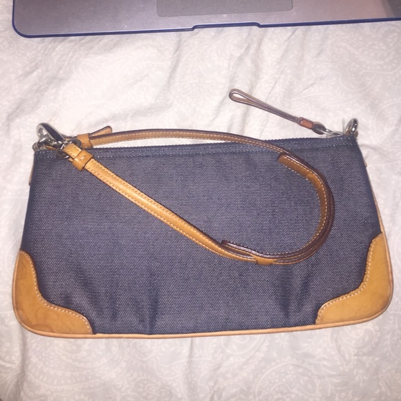 Coach purse, jean material & light brown leather.