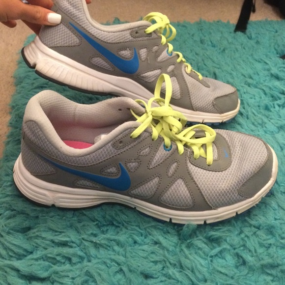 NIKE gray running shoes