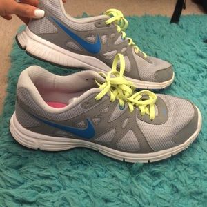 NIKE gray running shoes