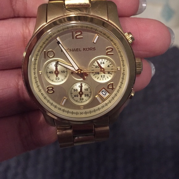 MK gold watch