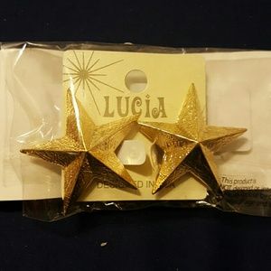 Star shaped clip on earrings