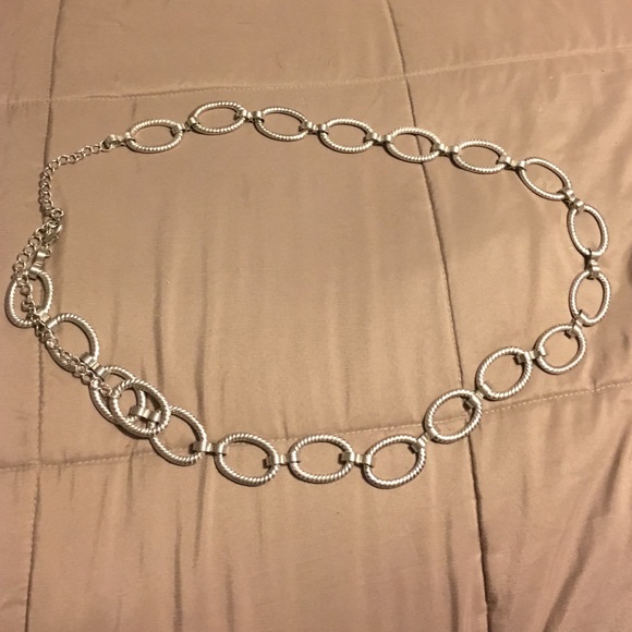 Silver oval adjustable belt