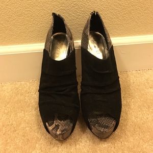 Leather and faux snakeskin peep toe pumps