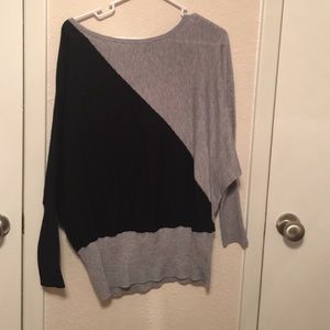 Asymmetrical block colored sweater