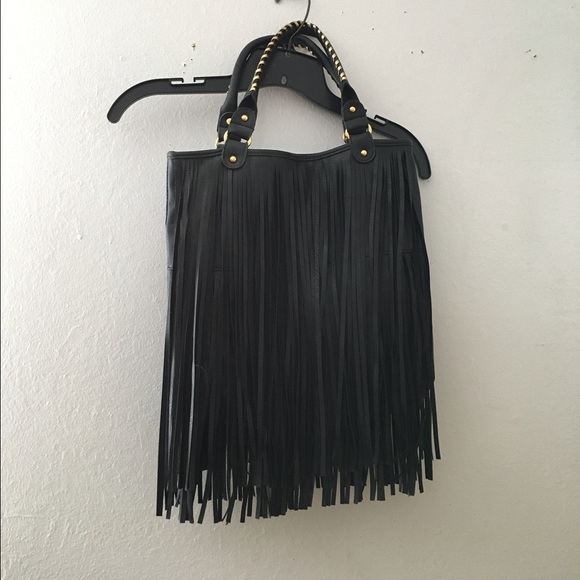 Wet seal fringe purse WITH TAGS OFFERS OKAY