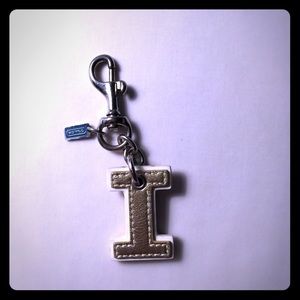 Coach letter I charm