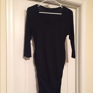 Black fitted dress with side ruching