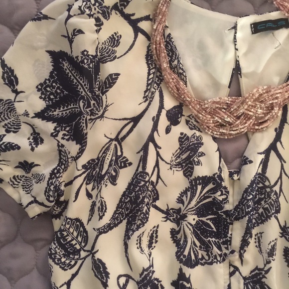 Blue white patterned romper medium fit