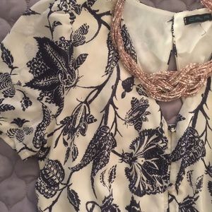 Blue white patterned romper medium fit