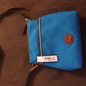 Brand new Dooney and Bourke cross body purse