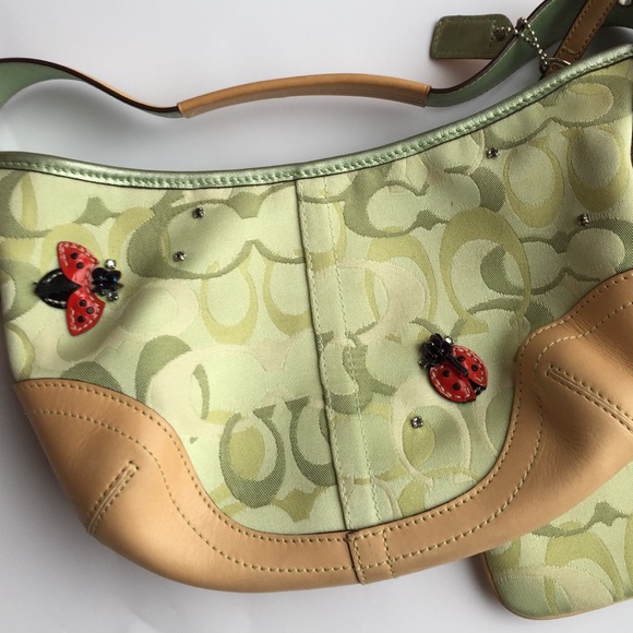 Adorable ladybug coach bag and matching wristlet