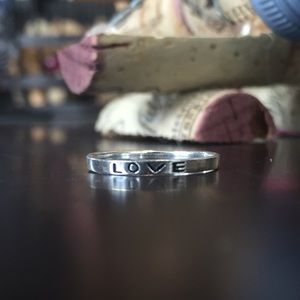 Sterling silver love ring.