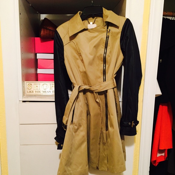 Trench coat with leather detail .. Size M