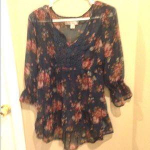 A blue floral top. Large