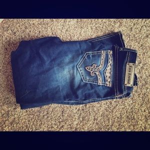 Rock revival buckle jeans.