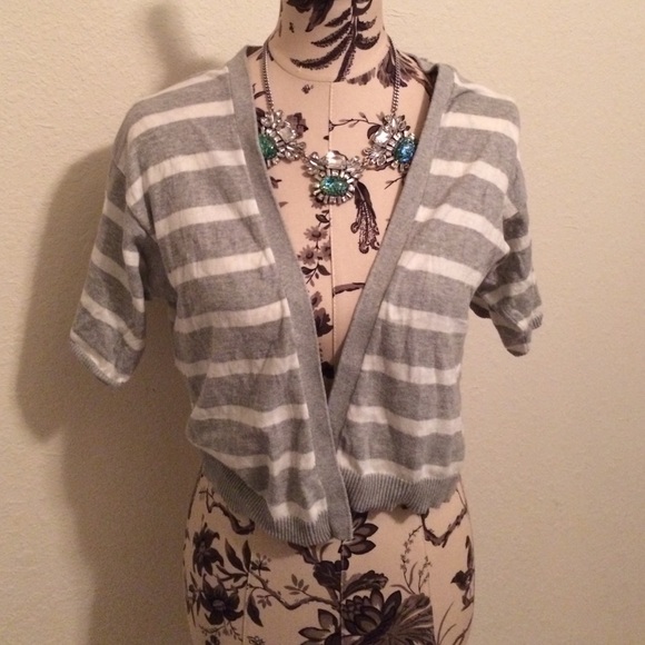 Three open 1/2 sleeve sweaters.