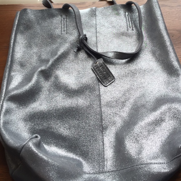 Brand new never used silver leather tote.