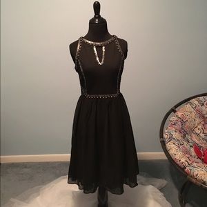 Black Cache dress with silver studded detail