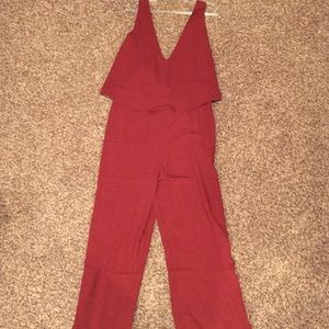 Cranberry colored romper Never worn! Tags attached