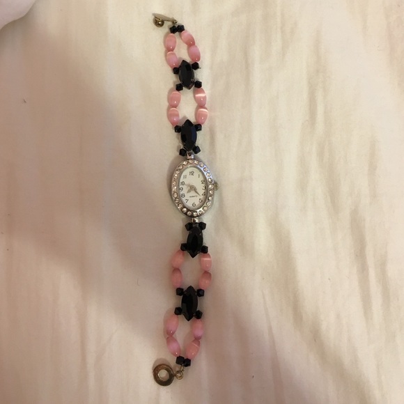 Pink and black watch