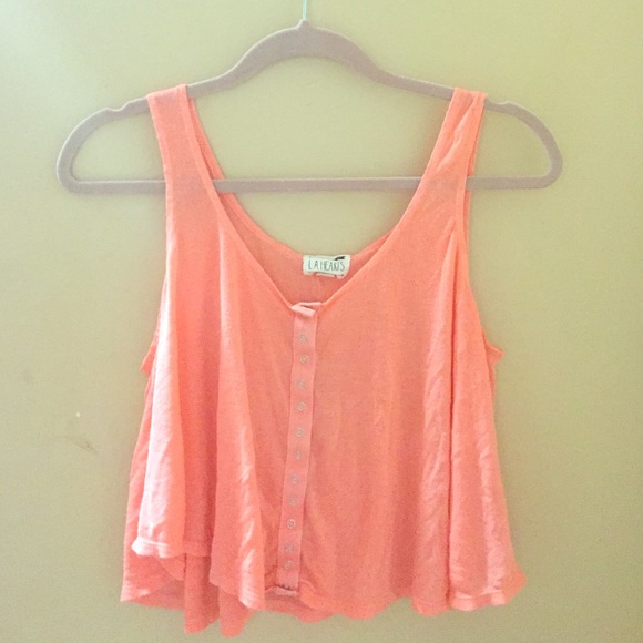 Peach colored flowy crop top from pacsun.