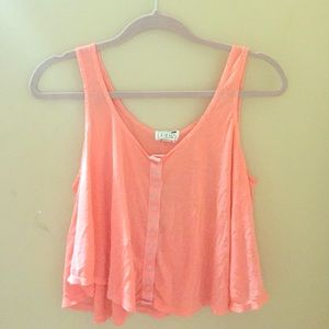 Peach colored flowy crop top from pacsun.
