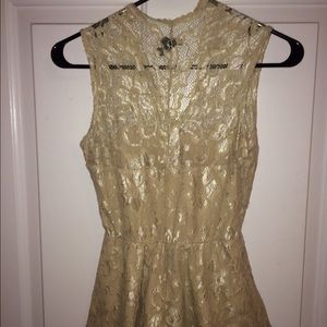 Gold printed peplum shirt