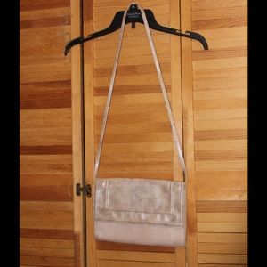 Pink suede shoulder bag