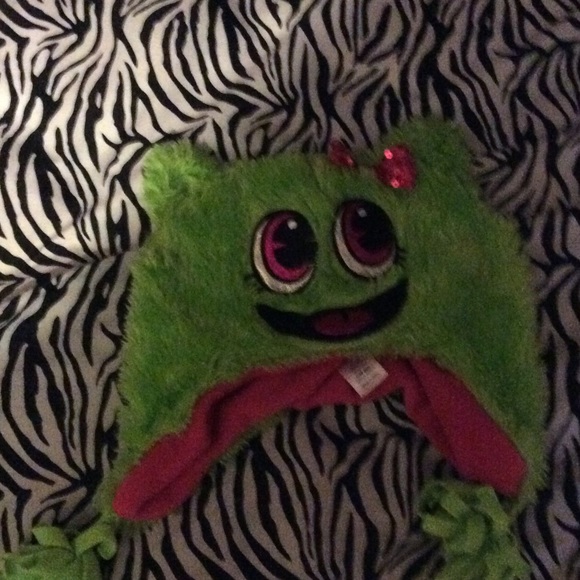 Hat that is green,pink,black,