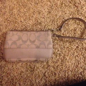 Coach wristlet a grey toned purple color