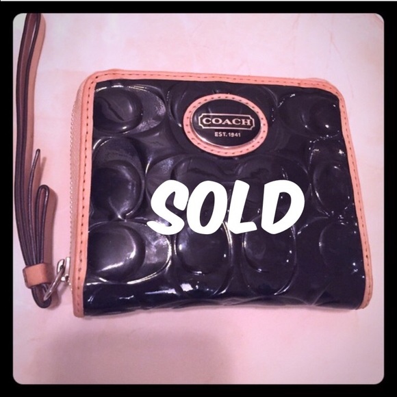 Authentic Coach black zip around wallet- Peyton