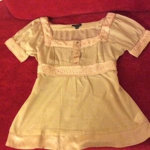 Bebe Top with Strap in the back. Size Large