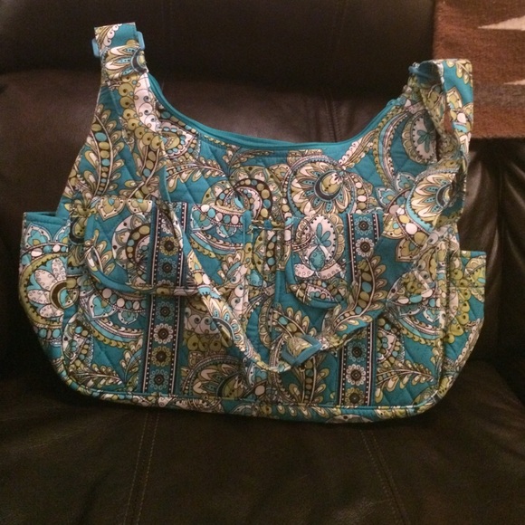 Vera Bradley cargo sling in peacock