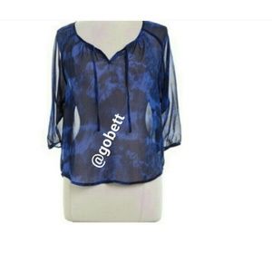 Royal blue and black blouse.