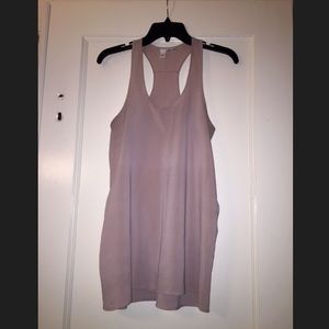 Pretty light pink silky shirt.