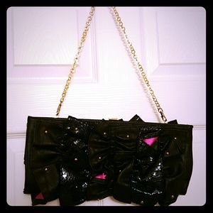 Rampage clutch with gold chain strap