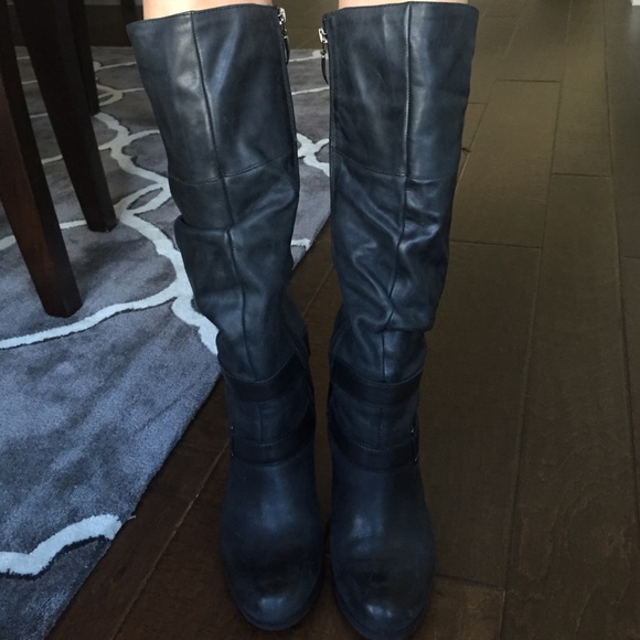 Guess size 7 black leather boots under the knee.