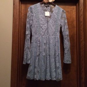 Cute lace dress. Light blue color.