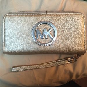 Gold Michael kors double zipper wallet